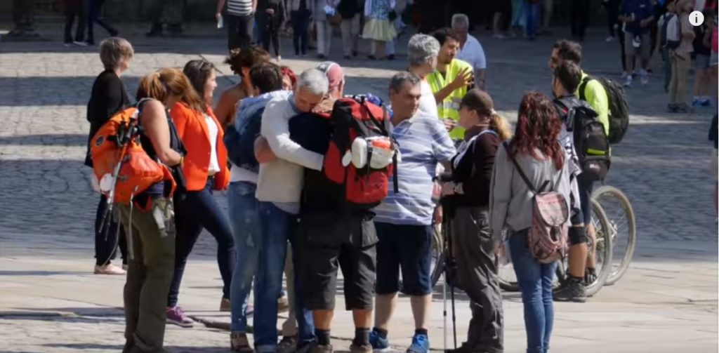 People receiving a warm embrace.